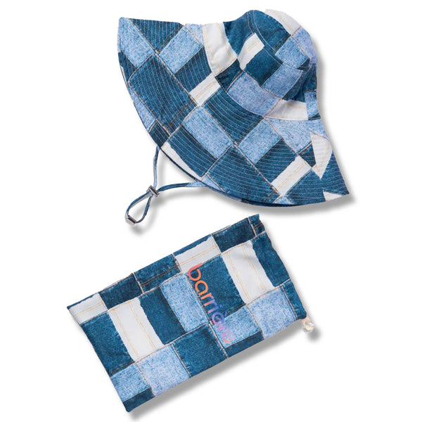 Two items with denim cloth design. The top item is a bucket hat with a wide, downward-sloping brim. Below it is a flat pouch with a rectangular shape. Both items feature a consistent denim cloth design with a white background and with minimal shadows of the products.