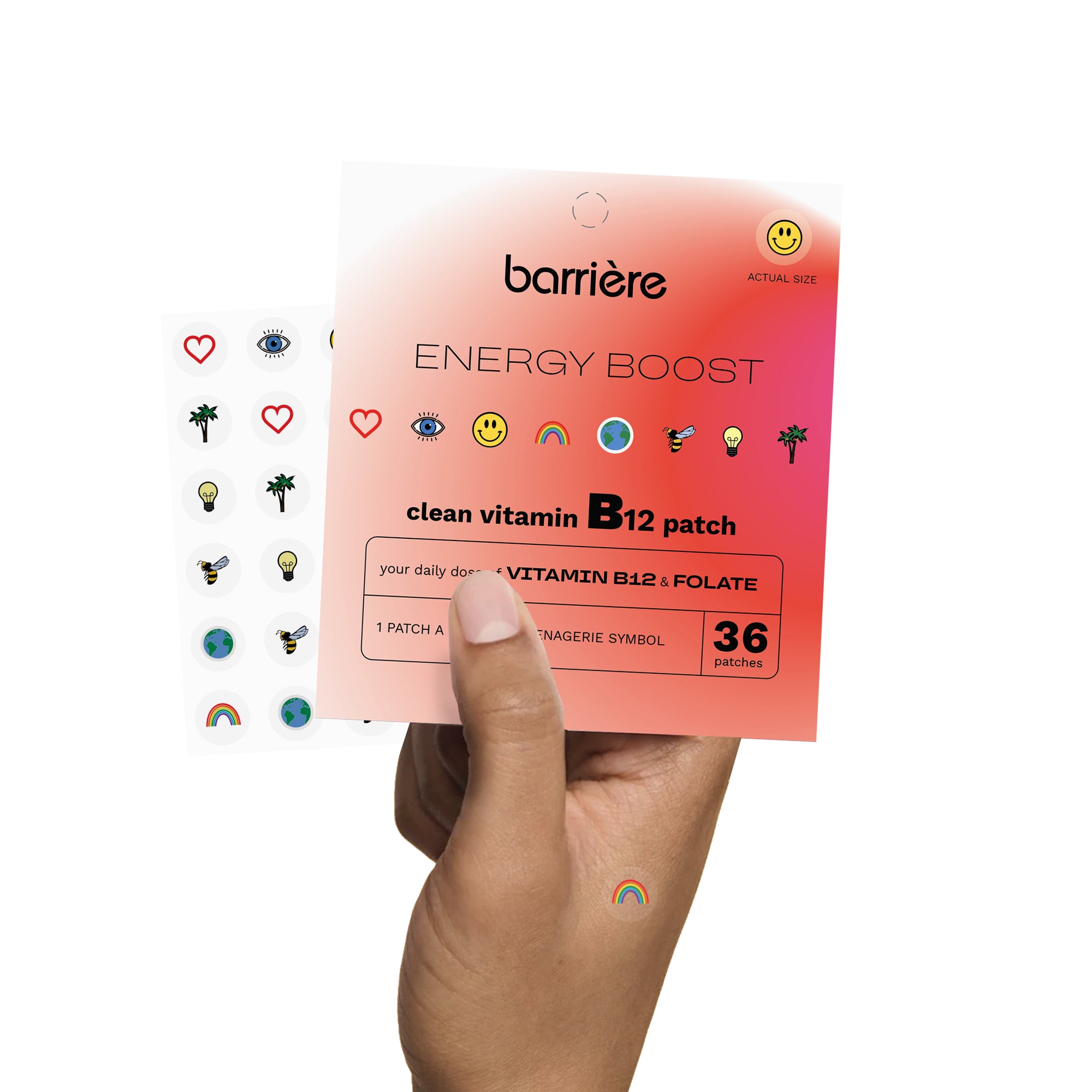 An individual hand, holding a packet of 36 multi-colored ‘ENERGY BOOST’ patches, with one rainbow patch visible on the right side of the hand. The 36 patches are slightly angled out from the side of the packaging.